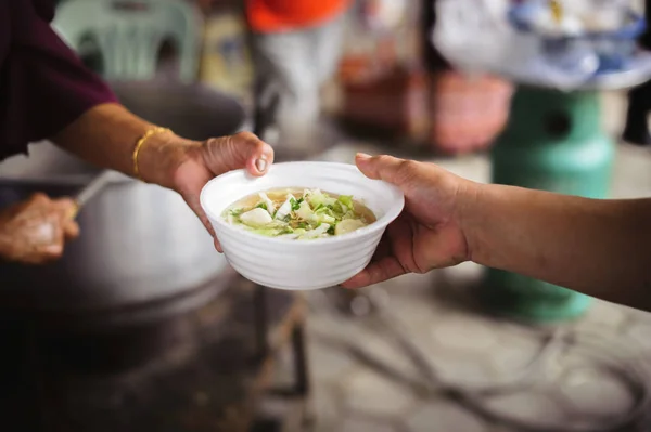 depositphotos 281880274 stock photo feeding concepts hand offered donate 1